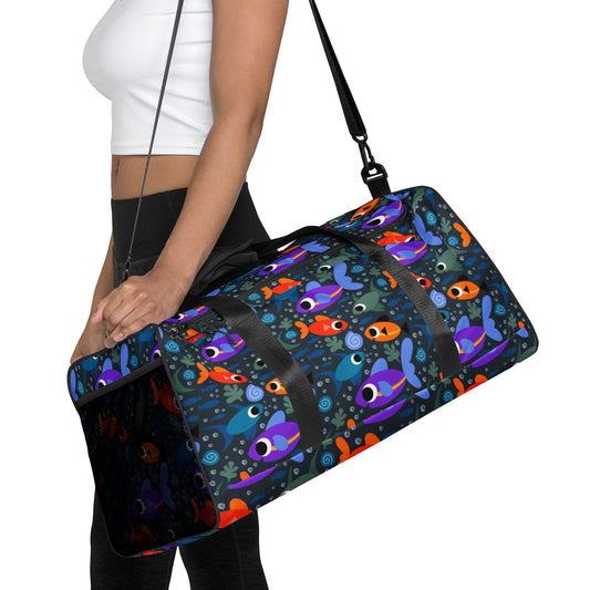 Colorful Fish Print Duffle bag woman holding bag